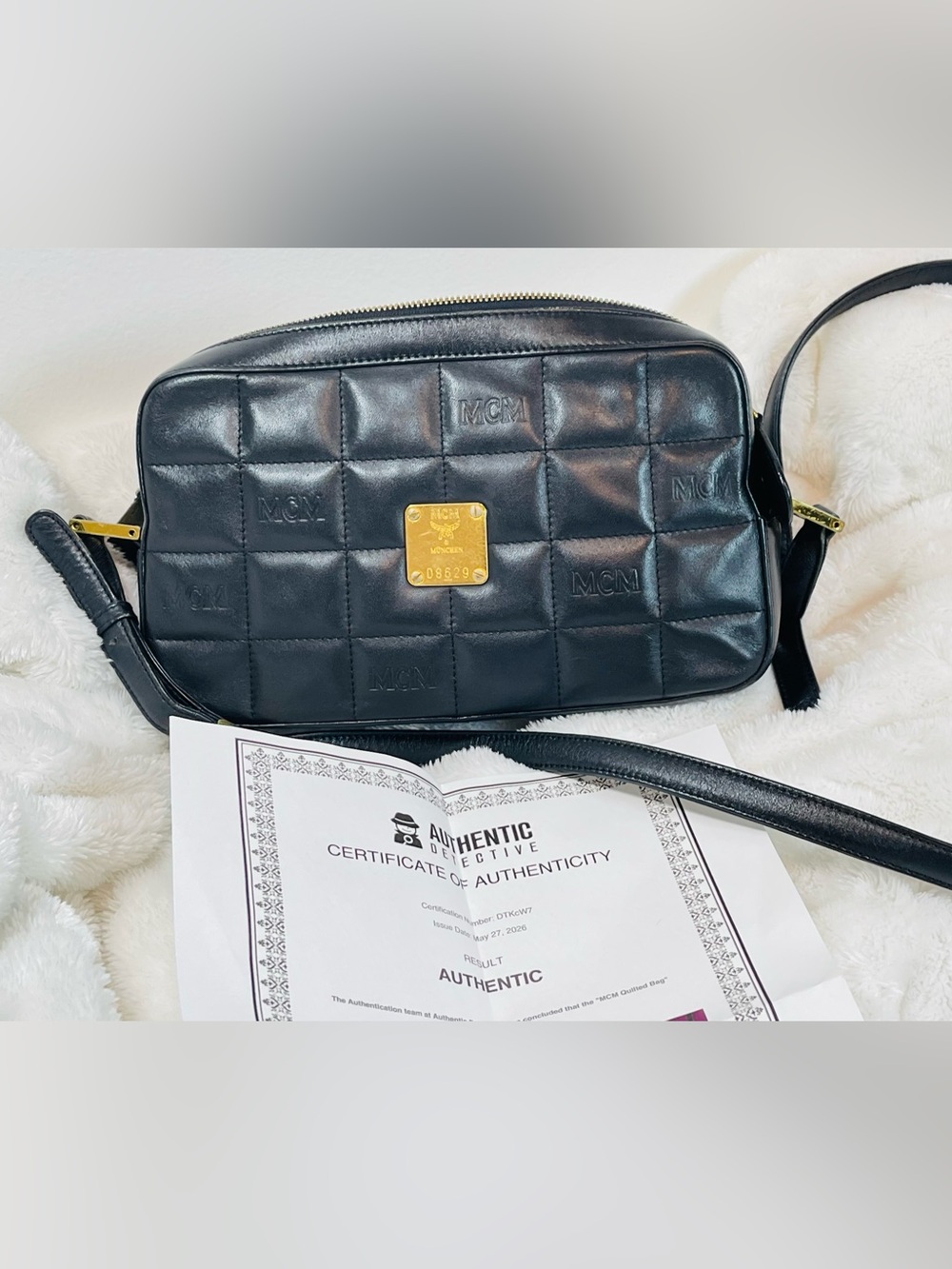 MCM Black Quilted Leather Crossbody with Gold Plaque
